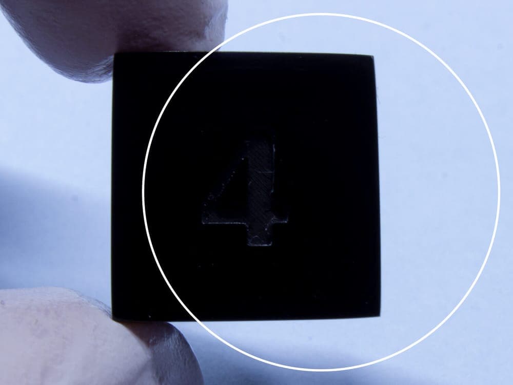 Close-up of the D6 face, circled